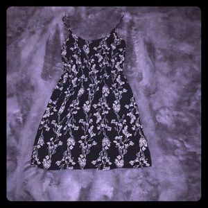 Black dress with white thin flowers